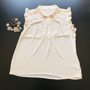 Cream sleeveless ruffle tuxedo top - M